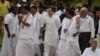 Congress party leader Rahul Gandhi (C) arrives to pay tribute at his father, slain former Indian prime minister Rajiv Gandhi's assassination memorial in Sriperumbudur on Sept. 7, 2022, before starting his party's Kanyakumari to Kashmir rally.