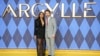 Ariana DeBose, left, Sam Rockwell pose for photographers upon arrival at the World premiere of the film 'Argylle,' in London, Britain, Jan. 24, 2024. (Scott A. Garfitt/Invision/AP)