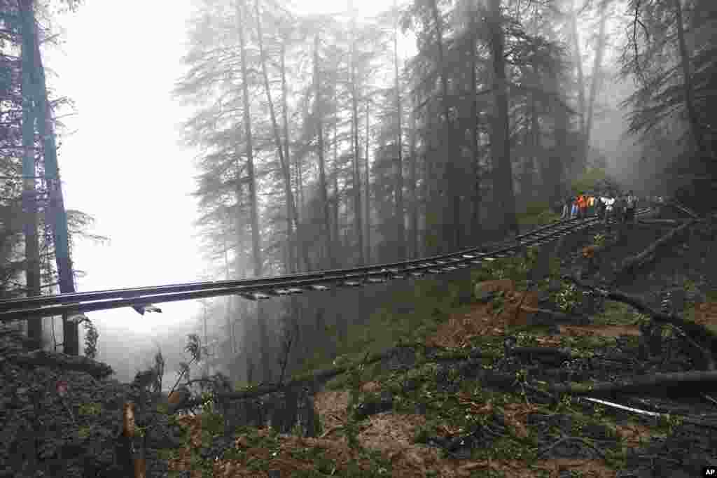 A portion of the Shimla-Kalka heritage railway track is seen washed away following heavy rainfall on the outskirts of Shimla, Himachal Pradesh state, India.&nbsp;