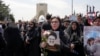 Mourners attend the funeral of Iran's President Ebrahim Raisi at Azadi square in Tehran, Iran, May 22, 2024.