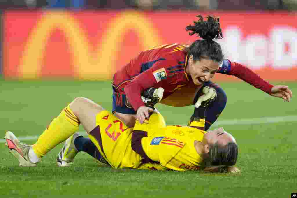 Spain&#39;s Ivana Andres celebrates with goalkeeper Cata Coll, on the ground, at the end of the Women&#39;s World Cup soccer final between Spain and England at Stadium Australia in Sydney, Australia.&nbsp;Spain won 1-0.