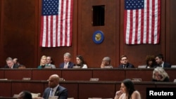 FILE - House Foreign Affairs Committee Chairman Michael McCaul poses a question to Ukraine's Prosecutor General Andriy Kostin during a hearing on alleged "Russian war crimes and other atrocities in Ukraine," on Capitol Hill in Washington, April 19, 2023.