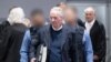 Prince Heinrich XIII Reuss arrives in the courtroom for the trial against him, a former MP and ex-army officers accused of masterminding a conspiracy theory-driven plot to attack the German parliament, May 21, 2024 in Frankfurt am Main, Germany. 