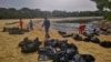 Singapore rushes to clean up oil slick after boat hits fuel supply ship 