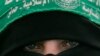FILE - A Palestinian Hamas supporter attends a protest against Israel's attacks on the Gaza Strip, in Gaza City, on March 3, 2008.