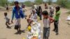 Displaced Yemenis receive humanitarian aid in the Hays region, south of Hodeidah governorate, Yemen, Aug. 16, 2024. Malnutrition is rampant in the country's government-controlled areas.