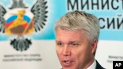FILE - In this file photo dated July 24, 2019, Russian Sports Minister Pavel Kolobkov speaks to the media in Moscow, Russia. 