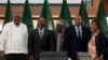 From left, Kenya's former president Uhuru Kenyatta, lead negotiator for Ethiopia's government, Redwan Hussein, African Union envoy Olusegun Obasanjo, lead Tigray negotiator Getachew Reda, and former South Africa's vice president Phumzile Mlambo-Ngcuka pos