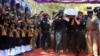 The body of India's National Security Guard commando, Niranjan Kumar, is carried by Indian soldiers as they pay their last respects in Bangalore, India, Jan. 4, 2016. 