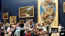 Le musée du Louvre rouvre ses portes (AP Photo/ Thibault Camus)