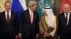 From left, Russian Foreign Minister Sergei Lavrov, Secretary of State John Kerry, Saudi Foreign Minister Adel al-Jubeir and Turkish Foreign Minister Feridun Sinirlioglu stand together before a meeting in Vienna, Austria, Oct. 29, 2015.