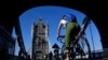 A cyclist is seen on Tower Bridge, following the outbreak of the coronavirus disease (COVID-19), in London, May 15, 2020. 