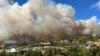 FILE - This photo taken by Pacific Palisades resident Darrin Hurwitz shows the Palisades fire as it approaches homes in Los Angeles, Jan. 7, 2025.
