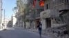 This handout frame grab from video provided by Doctors Without Borders, shows a house on fire in Aleppo, Syria, Oct. 5, 2016. Rebel-held parts of the city have been under sustained aerial assault by Syrian government and Russian forces.