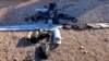Wreckage of a drone is laid out near the Ain al-Asad air base, in the western Anbar province of Iraq, Jan. 4, 2022. Two explosives-laden drones targeting the base housing U.S. troops were destroyed by defensive capabilities at the base on Tuesday, a coalition official said.
