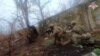 Tentara Rusia sedang bertempur di luar Vuhledar, wilayah Donbas, Ukraina, Jumat, 27 Desember 2024. (Foto: Russian Defense Ministry Press Service via AP)