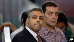 Les deux journalistes d'Al-Jazeera, Mohammed Fahmy et Baher Mohammed.