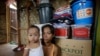 Typhoon survivor Emily Sagalis poses with baby Bea Joy inside her modest home near the Philippines’ coastal City of Tacloban, Nov.5, 2014. Bea Joy was named for her grandmother, Beatrice, who died in the storm.