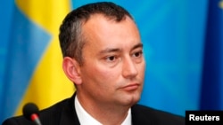 FILE - Special Representative for Iraq Nickolay Mladenov speaks during a joint news conference in the headquarters of the foreign ministry in Baghdad.