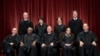 The justices of the U.S. Supreme Court gather for a formal group portrait at the Supreme Court Building in Washington, Nov. 30, 2018.