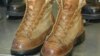 VOA correspondent Steve Herman's boots, before recrafting, after nearly a quarter century of wear. (Steve Herman/VOA) 