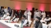 Members of the Taliban delegation are seen at the opening session of peace talks between the Afghan government and the Taliban, in Doha, Qatar, Sept. 12, 2020. 