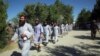 FILE - Taliban prisoners are released from Bagram Prison in Parwan province, Afghanistan, May 26, 2020. 