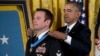 President Barack Obama presents the Medal of Honor to Senior Chief Special Warfare Operator Edward Byers during a ceremony in the East Room of the White House in Washington, Feb. 29, 2016. 