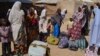 Families from Gwoza, Borno State, displaced by the violence and unrest caused by the insurgency, are seen at a refugee camp in Mararaba Madagali, Adamawa State, Feb. 18, 2014.