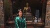Museum guide Tashi Pelden counts herself among the fortunate few young people who have landed a job. (A. Pasricha/VOA)