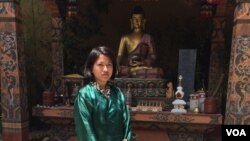 Museum guide Tashi Pelden counts herself among the fortunate few young people who have landed a job. (A. Pasricha/VOA)