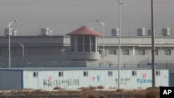 FILE - This facility is shown in the Kunshan Industrial Park in Artux, in China's Xinjiang region, Dec. 3, 2018. China responded with condemnation, Dec. 4, 2019, after the U.S. Congress approved a bill targeting its crackdown on ethnic Muslim minorities.