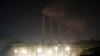 FILE - Steams spew from the chimneys of a coal power plant, in Cilegon, Banten province, Indonesia, on Oct. 3, 2023. Pollution is causing respiratory illnesses and deaths to rise in Indonesia's island of Java, including the capital, Jakarta.