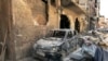 Rubble lines a street in Douma, the site of a suspected chemical weapons attack, near Damascus, Syria, on April 16, 2018. (Hassan Ammar/AP)