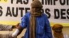Alhader Ag Almahmoud, a 30-year-old Tuareg herder whose right hand was amputated last month by an Islamist group, displays his bandaged arm at an Amnesty International press conference in Bamako, Mali, September 20, 2012.