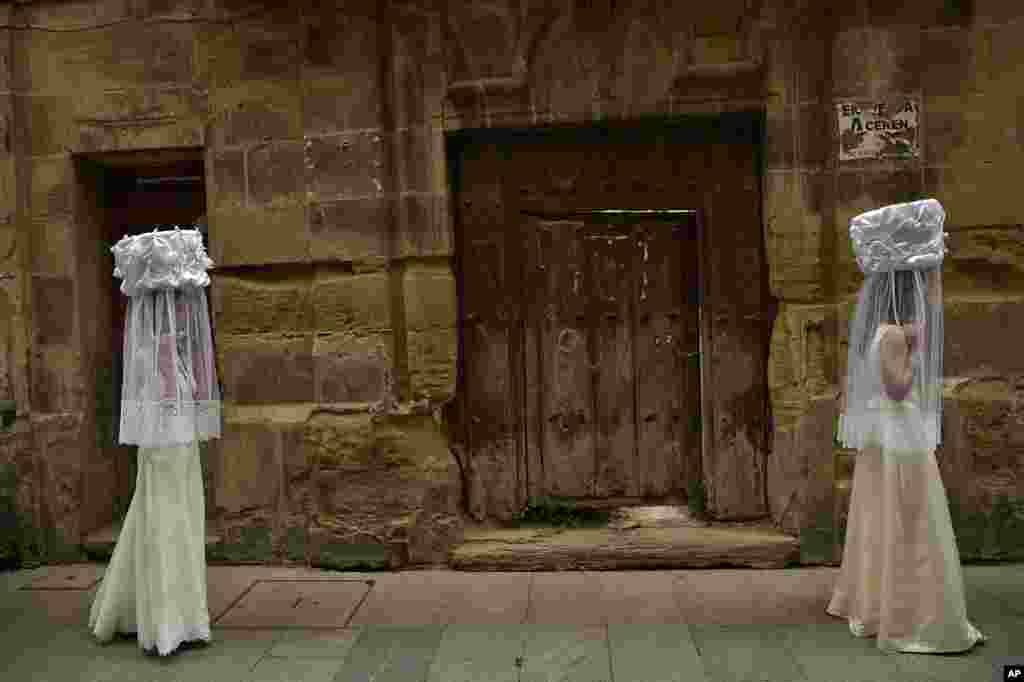 Participants of ''Bread Procession of the Saint'', take part in a ceremony to honor Domingo de La Calzada Saint (1019-1109) who helped poor people and pilgrimage, in Santo Domingo de La Calzada, northern Spain.