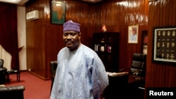 FILE - Hama Amadou is seen at his office in the National Assembly in Niamey, Niger, Sept. 16, 2013. He has been in jail since November on baby-trafficking charges — allegations he and his supporters say are politically motivated. 