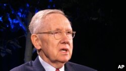 FILE - kiongozi wa zamani wa walio wengi katika Baraza la Seneti Harry Reid akitoa mhadhara Chuo Kikuu cha Nevada, Reno, Aprili 3, 2018. (AP Photo/Scott Sonner)