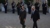 French President Emmanuel Macron, left, welcomes Australia's Prime Minister Scott Morrison before a working dinner in Paris, June 15, 2021.