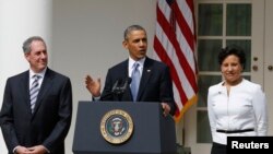U.S. President Barack Obama announces Penny Pritzker (R) as his new nominee for the U.S. Secretary of Commerce and Michael Froman (L) as his nominee for U.S. Trade Representative while in the Rose Garden at the White House in Washington, May 2, 2013. 