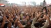 Egyptian anti-Mubarak protesters react in Cairo's Tahrir square on June 2, 2012. 