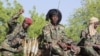 FILE - Chadian soldiers of the Joint Task Force fighting Boko Haram jihadists are seen patrol in Monguno, Nigeria, Dec. 15, 2019.