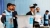 FILE - Afghan incumbent president and presidential candidate Ashraf Ghani arrives to cast his vote in Kabul, Afghanistan, Sept. 28, 2019. 