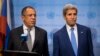 Russian Foreign Minister Sergei Lavrov, left, speaks during a news conference next to U.S. Secretary of State John Kerry at the U.N., Sept. 30, 2015.