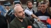Italian journalist Roberto Saviano adresses the press on Oct. 12, 2023, after receiving a guilty verdict in a libel trial brought by Prime Minister Giorgia Meloni.