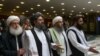 FILE - Mullah Abdul Ghani Baradar, the Taliban group's top political leader, arrives with other members of a delegation for talks in Moscow, May 28, 2019. The top Taliban negotiator says a negotiating team has been finalized for intra-Afghan negociations.