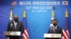 U.S. Defense Secretary Lloyd Austin, left, and South Korean Defense Minister Suh Wook attend a news conference following the 53rd Security Consultative Meeting a​t the Defense Ministry in Seoul, South Korea, Dec. 2, 2021. 