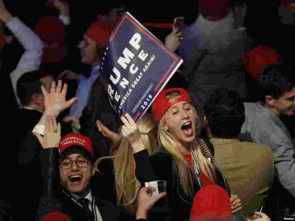 Trump supporters celebrate as they watch election returns come in at Republican presidential nominee Donald Trump's election night rally in Manhattan, New York, Nov. 8, 2016.