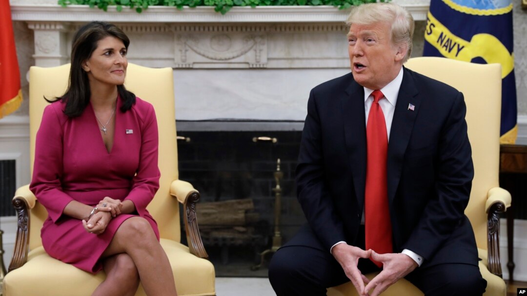 President Donald Trump meets with outgoing U.S. Ambassador to the United Nations Nikki Haley in the Oval Office of the White House, Tuesday, Oc. 9, 2018, in Washington. (AP Photo/Evan Vucci)