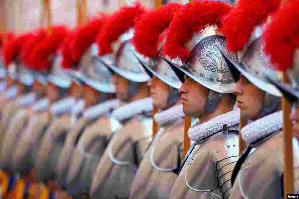 New recruits of the Vatican's elite Swiss Guard stand in the courtyard prior to a swearing-in ceremony at the Vatican.